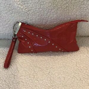 Red wristlet purse with silver stud detail